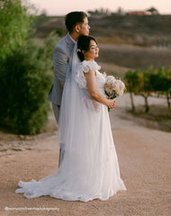 White Ruffle Tiered Cut-Out Chiffon Gown